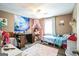Another bedroom with twin bed and desk at 315 Charlotte Blvd, Stockbridge, GA 30281