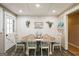 Farmhouse style dining area with white table and chairs at 315 Charlotte Blvd, Stockbridge, GA 30281