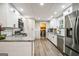 Updated kitchen with stainless steel appliances and white cabinets at 315 Charlotte Blvd, Stockbridge, GA 30281