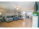 Spacious living room with L-shaped sofa and hardwood floors at 315 Charlotte Blvd, Stockbridge, GA 30281