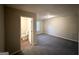 Bright bedroom with ensuite bathroom and grey carpeting at 1351 Renee Dr, Decatur, GA 30035