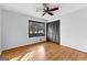 Spacious bedroom with hardwood floors and ceiling fan at 305 Kelly Dr, Fayetteville, GA 30214