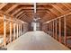 Large unfinished bonus room with access to exterior deck at 305 Kelly Dr, Fayetteville, GA 30214