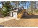 Detached garage with upper level and yard access at 305 Kelly Dr, Fayetteville, GA 30214