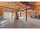 Spacious garage with ample storage shelving and overhead door at 305 Kelly Dr, Fayetteville, GA 30214