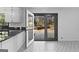 Kitchen with granite countertop and door to backyard at 305 Kelly Dr, Fayetteville, GA 30214