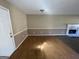 Bright living room with hardwood floors and a fireplace at 270 Mountain Way, Covington, GA 30016