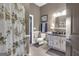 Spa-like bathroom with a shower/tub combo and updated fixtures at 506 W Mcintosh Rd, Brooks, GA 30205