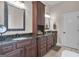 Bathroom with double vanity, large mirror, and a separate shower at 506 W Mcintosh Rd, Brooks, GA 30205