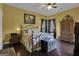 Spacious bedroom with dark hardwood floors and a large wardrobe at 506 W Mcintosh Rd, Brooks, GA 30205
