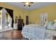 Bedroom with French doors leading to the backyard at 506 W Mcintosh Rd, Brooks, GA 30205