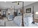 Elegant bedroom with a post bed and kitchenette at 506 W Mcintosh Rd, Brooks, GA 30205