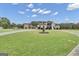 House with a fountain and a large yard at 506 W Mcintosh Rd, Brooks, GA 30205