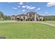 Spacious two-story home with attached garage and manicured lawn at 506 W Mcintosh Rd, Brooks, GA 30205