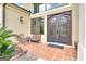 Elegant entryway with double doors and a tiled porch at 506 W Mcintosh Rd, Brooks, GA 30205