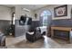 Game room with flat-screen TV, comfortable seating, and wood accents at 506 W Mcintosh Rd, Brooks, GA 30205