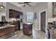 Well-equipped kitchen featuring dark wood cabinets and granite countertops at 506 W Mcintosh Rd, Brooks, GA 30205