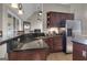 Kitchen with stainless steel appliances and granite countertops at 506 W Mcintosh Rd, Brooks, GA 30205