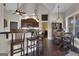 Eat-in kitchen with hardwood floors and a charming table at 506 W Mcintosh Rd, Brooks, GA 30205