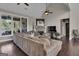 Spacious living room with hardwood floors, fireplace and large windows at 506 W Mcintosh Rd, Brooks, GA 30205
