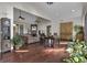 Spacious living room with hardwood floors, fireplace, and large windows at 506 W Mcintosh Rd, Brooks, GA 30205