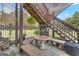 Covered patio with stone table and benches at 506 W Mcintosh Rd, Brooks, GA 30205