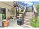 Outdoor patio with stairs, seating, and plants at 506 W Mcintosh Rd, Brooks, GA 30205