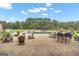 Inviting pool and patio with seating and dining areas at 506 W Mcintosh Rd, Brooks, GA 30205