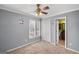 Bedroom featuring ceiling fan and access to bathroom at 1934 Hobson Sw Ct, Marietta, GA 30064