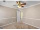 Bedroom with ceiling fan and neutral wall colors at 1934 Hobson Sw Ct, Marietta, GA 30064