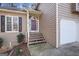 House entrance with steps leading to a burgundy door at 1934 Hobson Sw Ct, Marietta, GA 30064