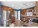 Modern kitchen with stainless steel appliances and granite countertops at 1934 Hobson Sw Ct, Marietta, GA 30064