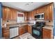 Corner kitchen with stainless steel appliances and granite countertops at 1934 Hobson Sw Ct, Marietta, GA 30064