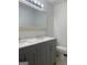 Bathroom with double vanity and updated fixtures at 7280 Oswego Trl, Riverdale, GA 30296