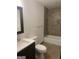 Clean bathroom with shower/tub combo and tile surround at 7280 Oswego Trl, Riverdale, GA 30296