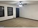 Living room with neutral walls and carpet flooring at 7280 Oswego Trl, Riverdale, GA 30296