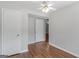 Bedroom with hardwood floors and closet at 5893 Nell Ln, Ellenwood, GA 30294