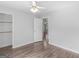 Well-lit bedroom with hardwood floors and a closet at 5893 Nell Ln, Ellenwood, GA 30294