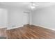 Well-lit bedroom with hardwood floors and ample closet space at 5893 Nell Ln, Ellenwood, GA 30294