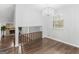 Elegant dining room with hardwood floors and a chandelier at 5893 Nell Ln, Ellenwood, GA 30294