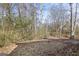 View of a backyard with lots of trees at 119 Bombay Ln, Grantville, GA 30220