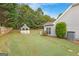 Landscaped backyard with gazebo and side yard at 228 Otter Cir, Fayetteville, GA 30215