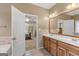 Bathroom with double vanity, tile flooring and access to bedroom at 228 Otter Cir, Fayetteville, GA 30215