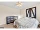 Bright bedroom featuring a dresser and window with natural light at 228 Otter Cir, Fayetteville, GA 30215