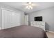 Comfortable bedroom with a dresser and a large TV at 228 Otter Cir, Fayetteville, GA 30215