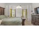 Spacious primary bedroom with high ceilings and large windows at 228 Otter Cir, Fayetteville, GA 30215