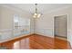 Formal dining room with hardwood floors and chandelier at 228 Otter Cir, Fayetteville, GA 30215