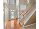Bright entryway with hardwood floors and staircase at 228 Otter Cir, Fayetteville, GA 30215
