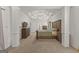 Main bedroom with carpeted floors, large windows and ceiling fan at 228 Otter Cir, Fayetteville, GA 30215
