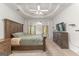 Spacious main bedroom with carpeted floors and large windows at 228 Otter Cir, Fayetteville, GA 30215
